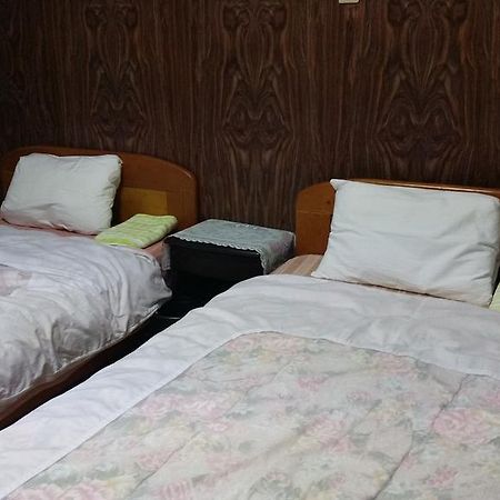 Minshuku Toshi Hotel Yakushima  Bagian luar foto